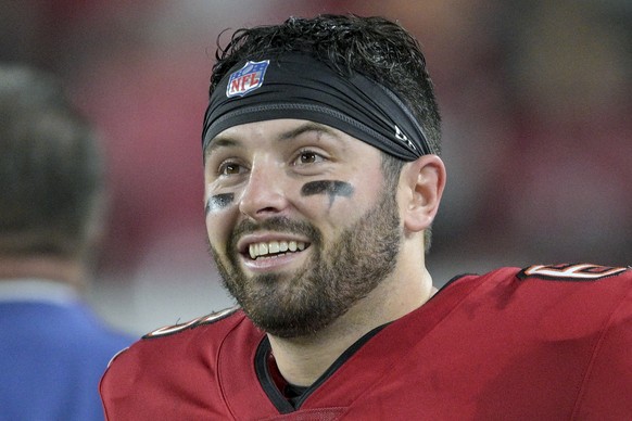 FILE - Tampa Bay Buccaneers quarterback Baker Mayfield reacts during the second half of an NFL wild-card playoff football game against the Philadelphia Eagles, Monday, Jan. 15, 2024, in Tampa, Fla. Th ...