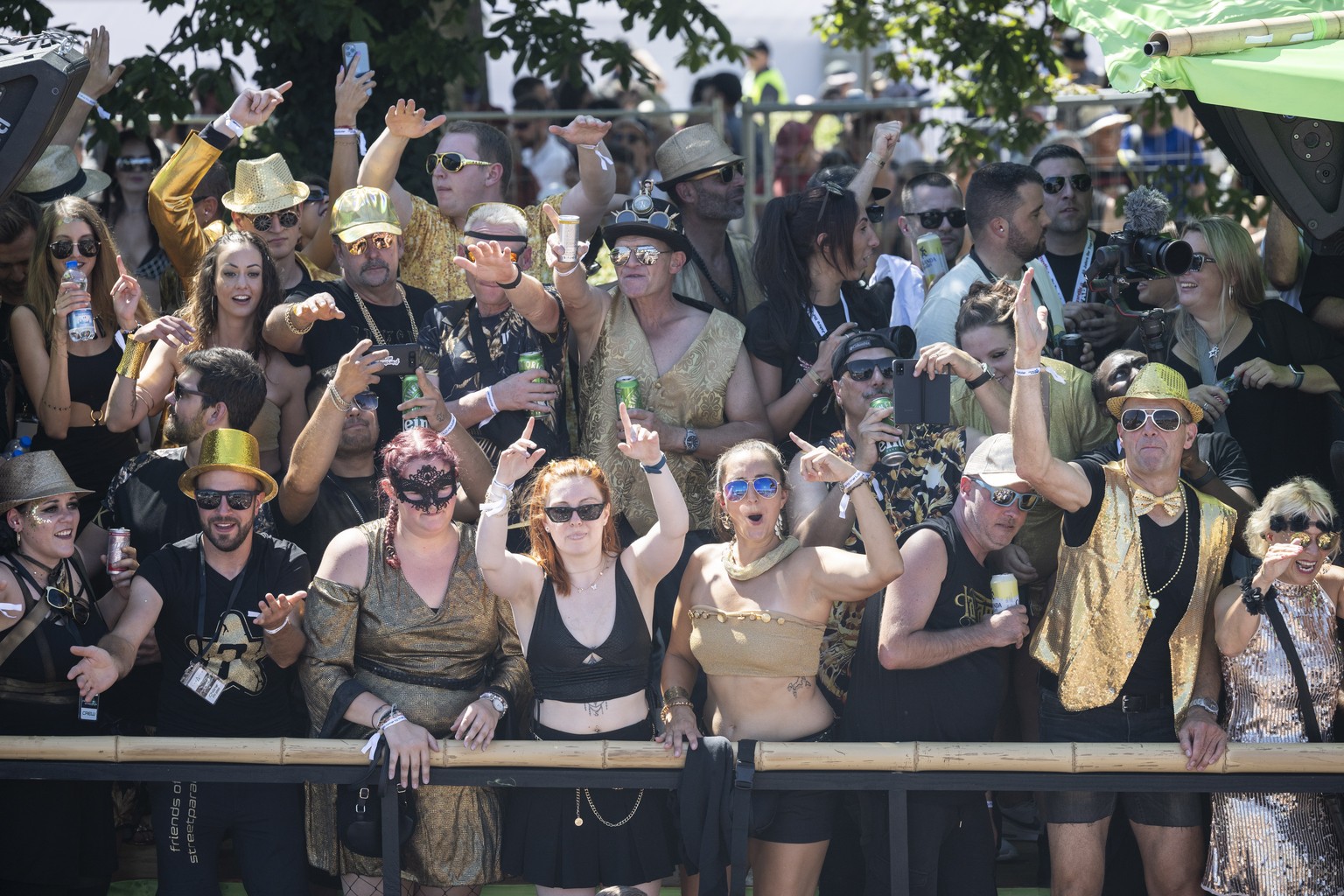 epa10118557 Costumed participant attend the 29th Street Parade in the city center of Zurich, Switzerland, 13 August 2022. The annual dance music event Street Parade runs this year under the motto &#03 ...