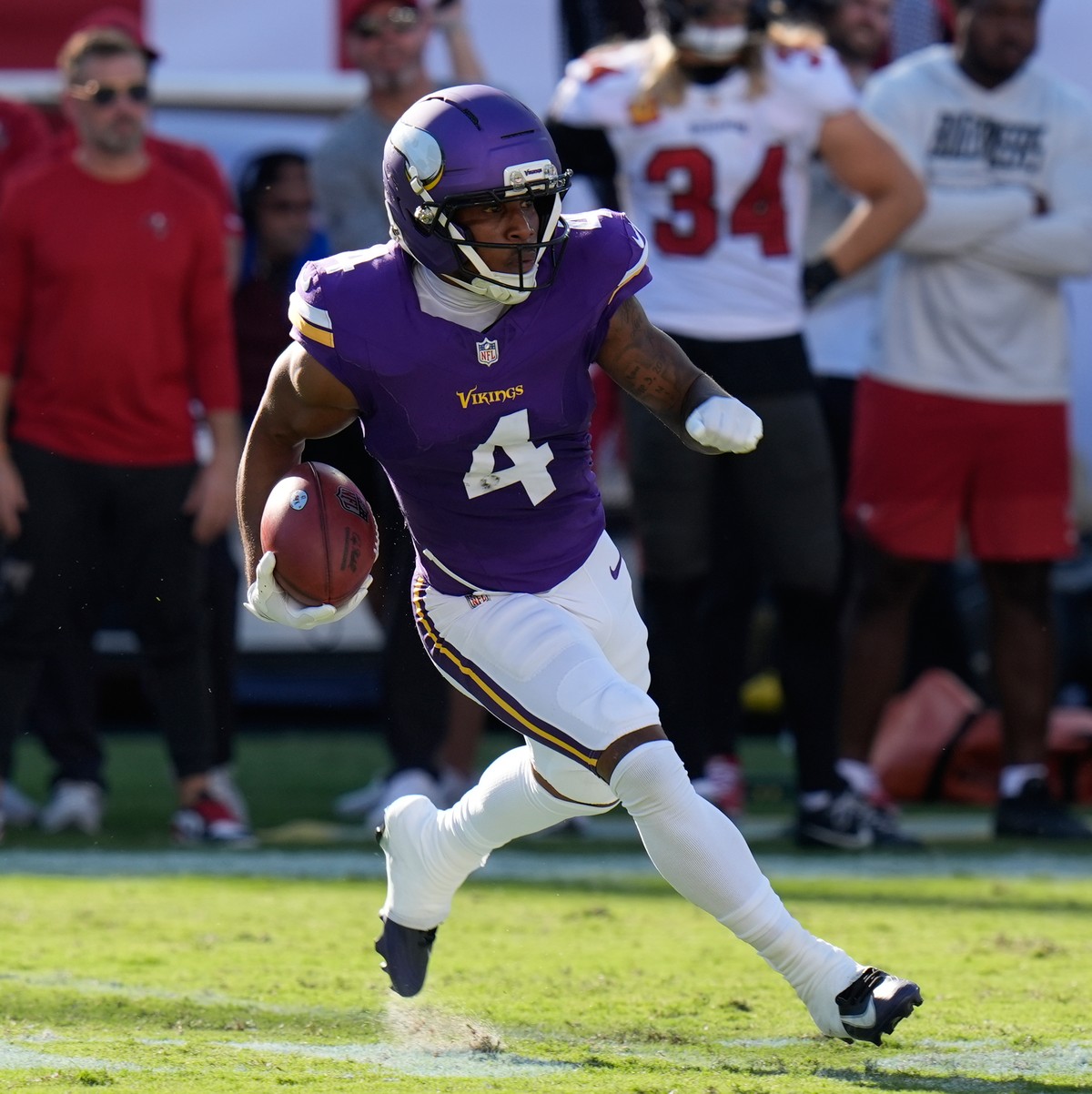Minnesota Vikings wide receiver Myles Price (4) runs with the football during the first half of an NFL football game against the Tampa Bay Buccaneers in Tampa, Fla., Sunday, Sept. 27, 2026. (AP Photo/ ...