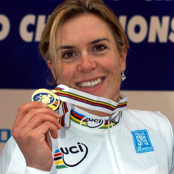 German Hanka Kupfernagel shows her gold medal after winning the cross country competition of the Cyclocross World Championships in St. Wendel, Germany, Sunday, 30 January 2005. EPA/HARALD TITTEL