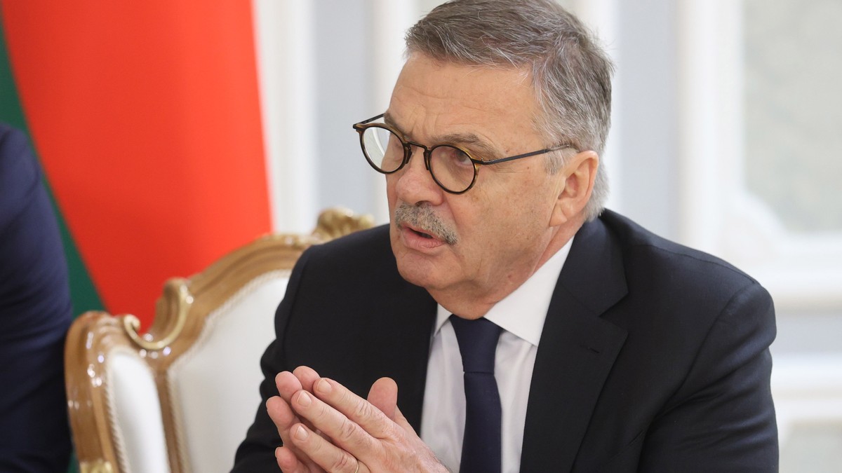 epa08931006 Rene Fasel, the president of the International Ice Hockey Federation (IIHF), talks during his meeting with Belarusian President Alexander Lukashenko in Minsk, Belarus, 11 January 2021. EPA ...
