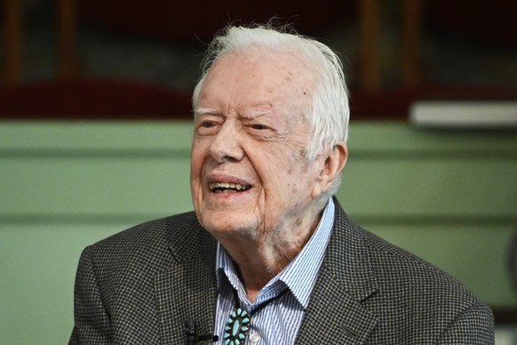 FILE - In this Nov. 3, 2019, file photo, former President Jimmy Carter teaches Sunday school at Maranatha Baptist Church in Plains, Ga. Nearly a year into the pandemic, Carter and his wife have return ...