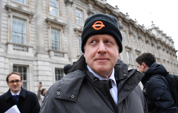 epa07448393 Former British Foreign Secretary Boris Johnson departs the Cabinet Office in London, Britain, 19 March 2019. British Prime Minister Theresa May has met with members of her Cabinet followin ...