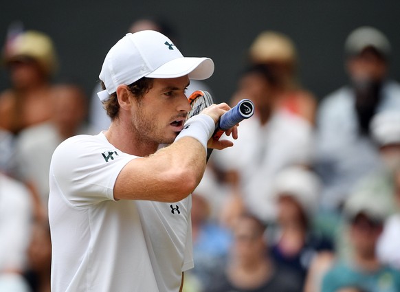 epa06079336 Andy Murray of Britain plays Benoit Paire of France in their fourth round match during the Wimbledon Championships at the All England Lawn Tennis Club, in London, Britain, 10 July 2017. EP ...