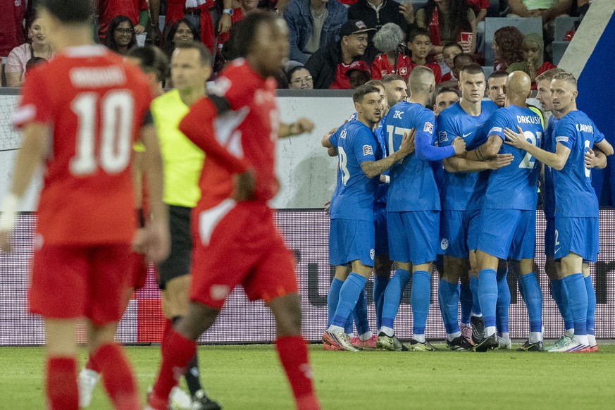 epa13279313 Slovenia's players celebrate Zan Vipotnik's 0-1 goal during the UEFA Nations League soccer match between Switzerland and Slovenia, in Lucerne, Switzerland, 03 October 2026. EPA/U ...