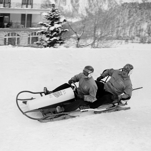 The U.S. two-man bobsleigh team of F.J. Fortune (pilot) and Schuyler Carron compete in the first run of the Olympic two-man bob competition at St. Moritz, Jan. 30, 1948. On the first run they placed f ...