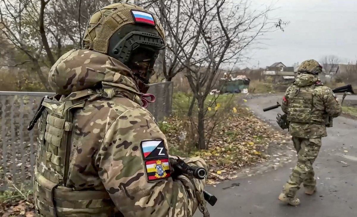 epa11734372 A still image taken from an undated handout video released by the Russian Defence Ministry Press-Service on 22 November 2024 shows Russian military volunteers of the 'Bars-Kursk' ...