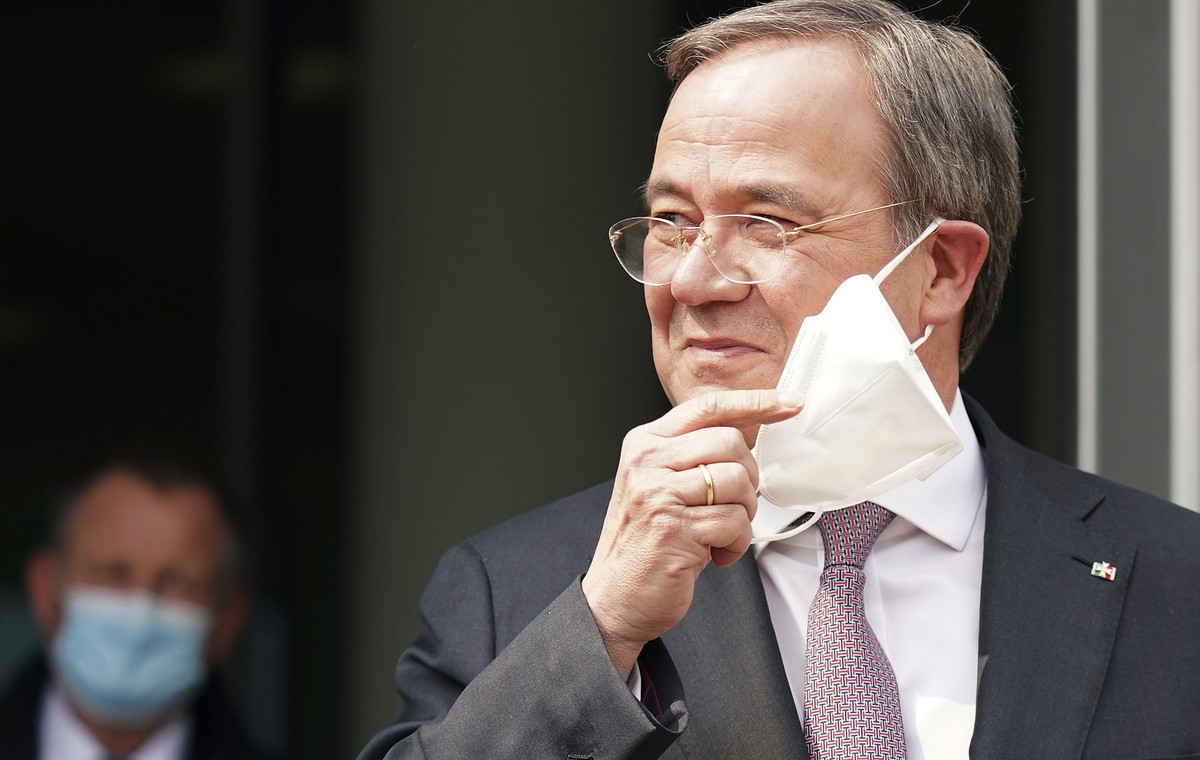 Armin Laschet, chairman of the German Christian Democratic party (CDU), addresses the media during a statement in front of the party's headquarters in Berlin, Germany, Monday, April 19, 2021. (AP ...
