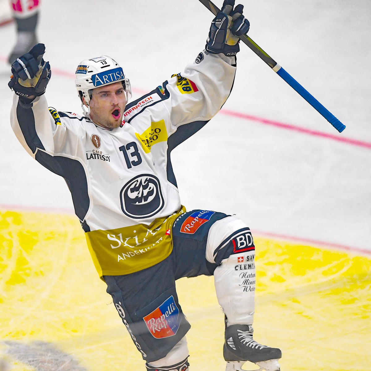 Ambri's player Marco Mueller celebrates the 0-3 goal, during the preliminary round game of National League A (NLA) Swiss Championship 2019/20 between HC Lugano and HC Ambri Piotta at the ice stad ...