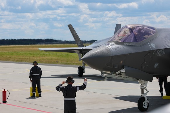 epa13032282 A Polish Air Force F-35 fighter jet lands at 332nd Tactical Air Base before the ceremony of F-35 fighter jets officially join the Polish Armed Forces in Lask, central Poland, 12 June 2026. ...
