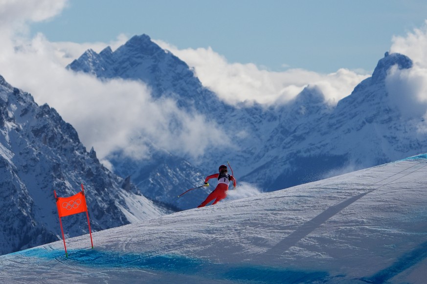 Switzerland's Malorie Blanc competes during an alpine ski women's downhill race, at the 2026 Winter Olympics, in Cortina d'Ampezzo, Italy, Sunday, Feb. 8, 2026. (AP Photo/Jacquelyn Mart ...