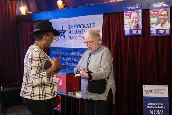epa11200763 US citizens cast their votes for the US primaries in the comedy club Boom Chicago, in Amsterdam, Netherlands, 05 March 2024. US voters head to the polls in 15 states spanning the breadth o ...