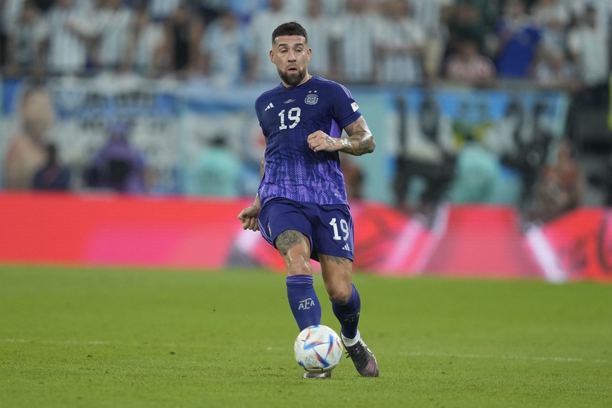 Argentina&#039;s Nicolas Otamendi controls the ball during the World Cup group C soccer match between Poland and Argentina at the Stadium 974 in Doha, Qatar, Wednesday, Nov. 30, 2022. (AP Photo/Jorge  ...