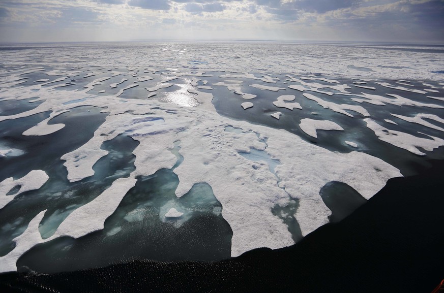 Sea ice melts on the Franklin Strait along the Northwest Passage in the Canadian Arctic Archipelago, Saturday, July 22, 2017. Because of climate change, more sea ice is being lost each summer than is  ...