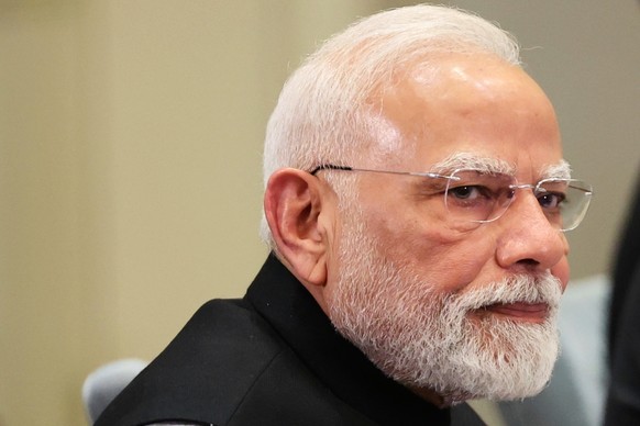 Indian Prime Minister Narendra Modi attends a meeting with Russian President Vladimir Putin on the sidelines of the Shanghai Cooperation Organization (SCO) summit in Tianjin, China, Monday, Sept. 1, 2 ...