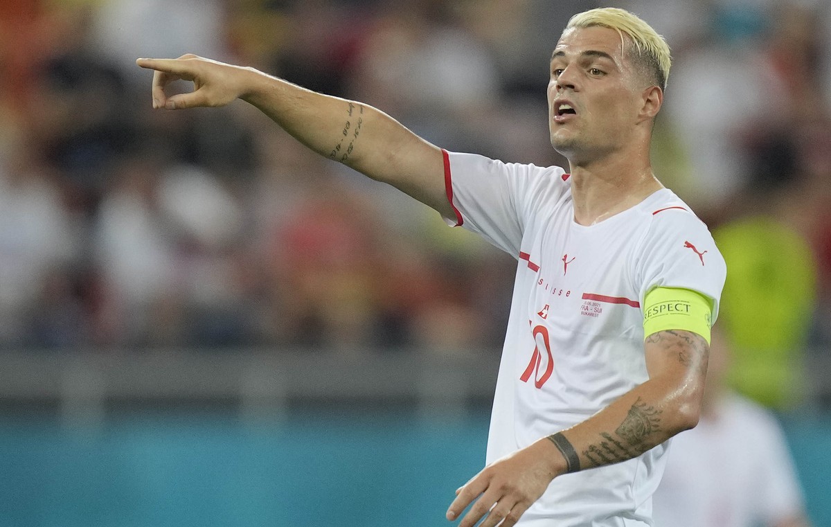 Switzerland's Granit Xhaka gestures during the Euro 2020 soccer championship round of 16 match between France and Switzerland at the National Arena stadium in Bucharest, Romania, Monday, June 28, ...