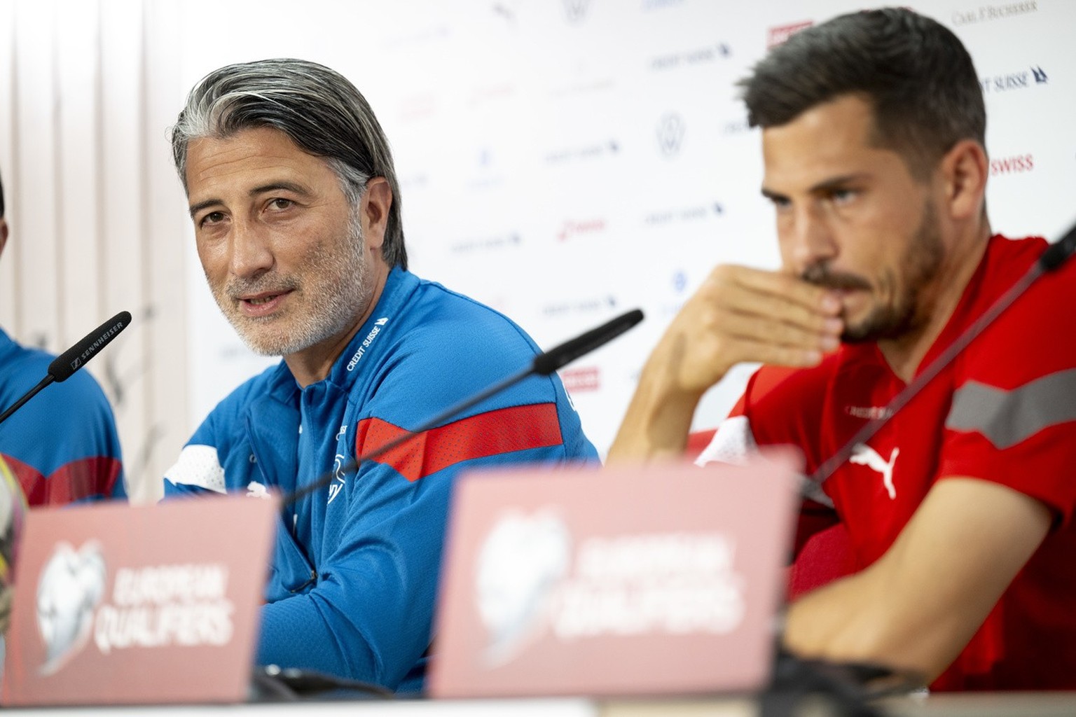 Switzerland&#039;s national team head coach Murat Yakin, left, and player Remo Freuler, right, speak during a press conference on the eve of the UEFA Euro 2024 qualifying group I soccer match between  ...