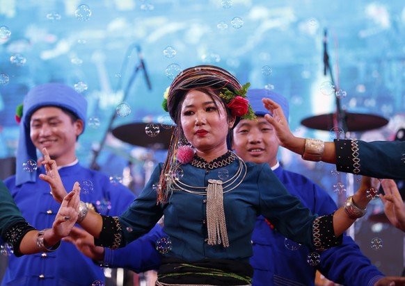 epa07255541 Shan ethnic people dance as they celebrate the New Year Countdown in Yangon, Myanmar, 31 December 2018. About 21 ethnic groups performed their traditional dances and celebrateed the New Ye ...