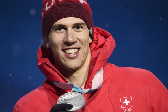 Silver medalist Ramon Zenhaeusern of Switzerland celebrates during the victory ceremony on the Medal Plaza for the men alpine skiing slalom event at the XXIII Winter Olympics 2018 in Pyeongchang, Sout ...