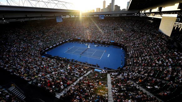 epa05721427 General view of the Rod Laver Arena on sunset during the match between Angelique Kerber of Germany and Lesia Tsurenko of Ukraine during the first round of the Womens Singles at the Austral ...