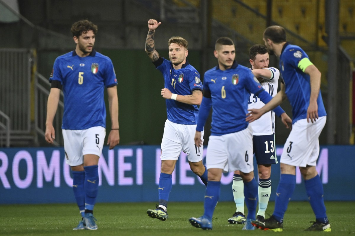 Italy's Ciro Immobile, second left, celebrates after scoring his team's second goal during the World Cup 2022 qualifier group c soccer game between Italy and Northern Ireland at the Stadio E ...