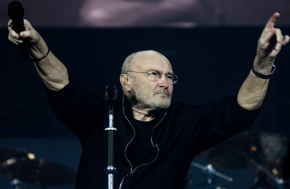 epa07633716 British singer Phil Collins performs on stage during a concert in Berlin, Germany, 07 June 2019, as part of his &#039;Not Dead Yet&#039; tour. EPA/CLEMENS BILAN