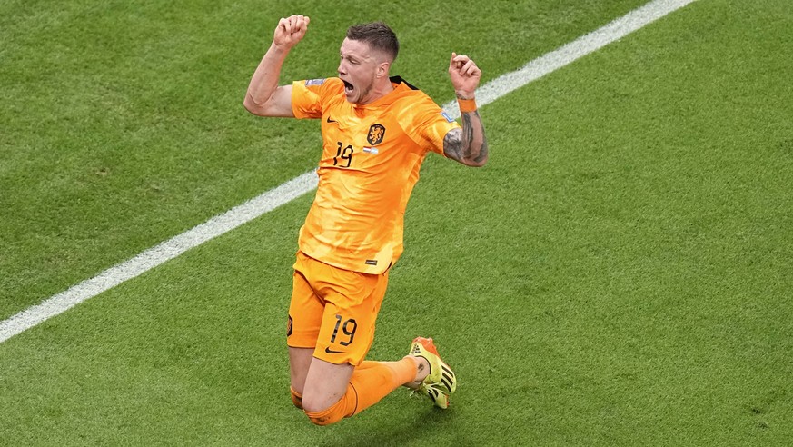 Wout Weghorst of the Netherlands celebrates after scoring during the World Cup quarterfinal soccer match between the Netherlands and Argentina, at the Lusail Stadium in Lusail, Qatar, Friday, Dec. 9,  ...