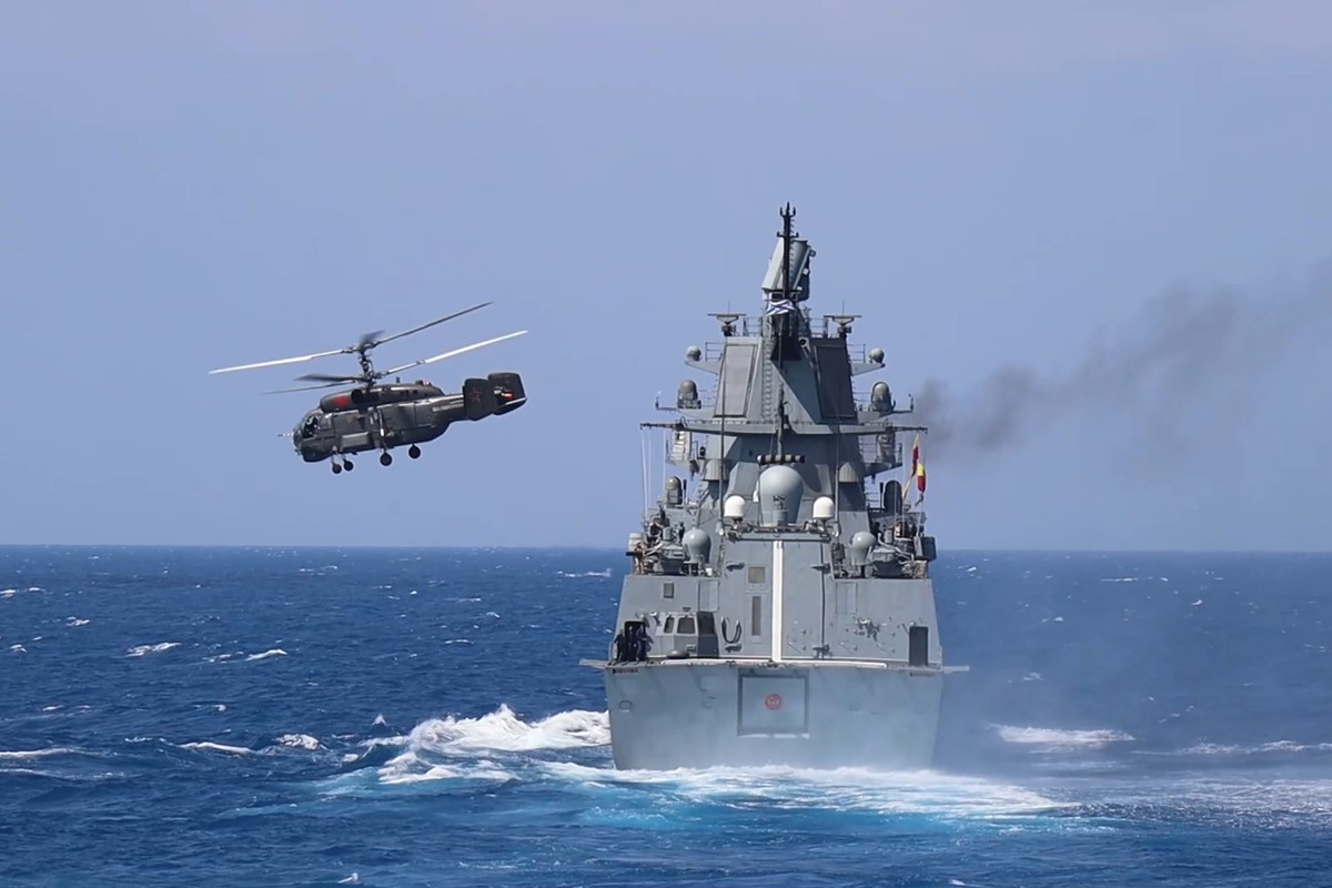 In this photo taken from video released by Russian Defense Ministry press service on Thursday, Sept. 12, 2024, Russian frigate Admiral Grigorovich sails while the Kamov Ka-27 helicopter takes off from ...