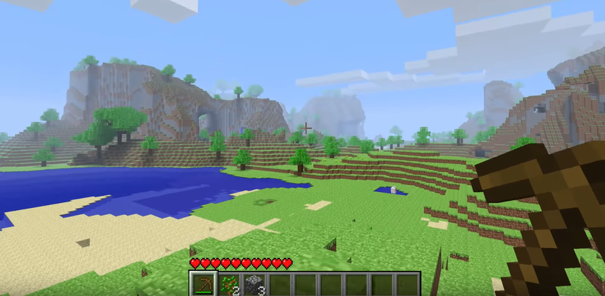 Screenshot aus dem Spiel <em>Minecraft</em> (2010). Das Spiel gibt kein festes Ziel vor, stattdessen können die Spielenden ihre Welt selber erkunden und aufbauen.