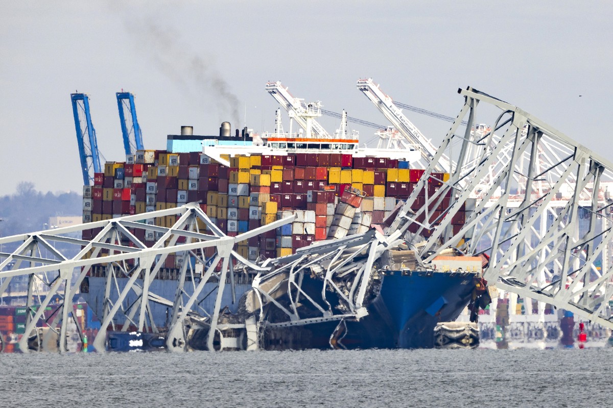 epa11244639 The Francis Scott Key Bridge rests partially collapsed after a cargo ship ran into it in Baltimore, Maryland, USA, 26 March 2024. The Maryland Department of Transportation (MDOT) confirmed ...