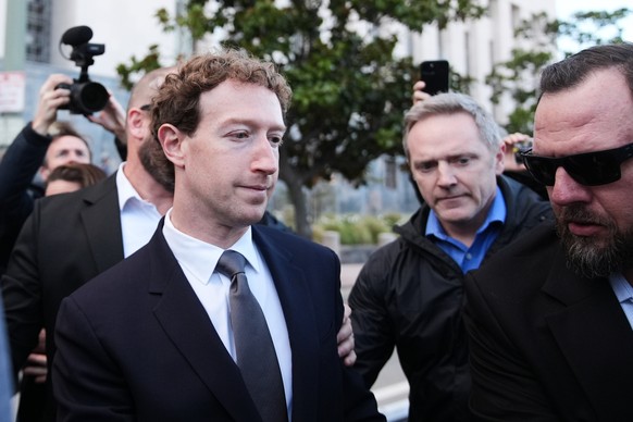 Meta CEO Mark Zuckerberg leaves after testifying in a landmark trial over whether social media platforms deliberately addict and harm children, Wednesday, Feb. 18, 2026, in Los Angeles. (AP Photo/Dami ...