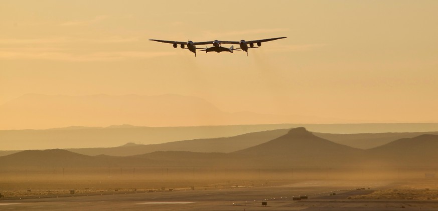 A jet carrying Virgin Galactic&#039;s tourism spaceship has taken off from Mojave Air and Space Port on Thursday, Dec. 13, 2018 in Mojave, Calif. The jet will climb to an altitude near 43,000 feet and ...