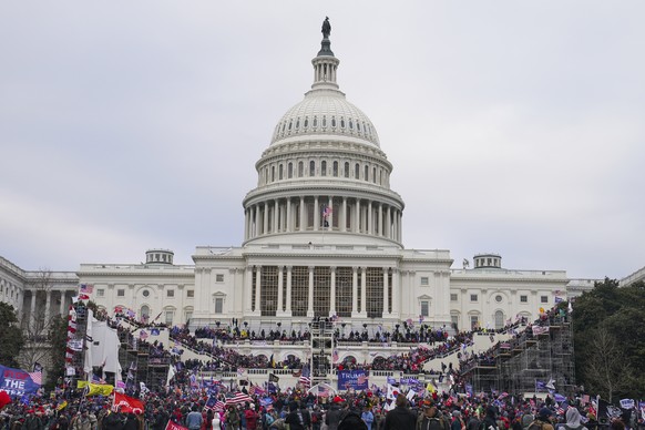 Insurrections loyal to President Donald Trump rally at the U.S. Capitol in Washington on Jan. 6, 2021. A federal appeals court has ruled against an effort by former President Donald Trump to shield do ...