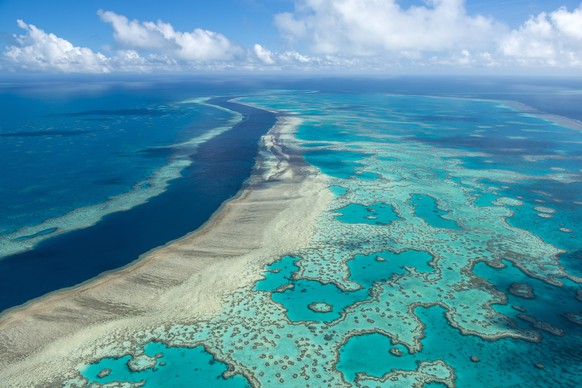 FILE - In this undated photo provided by the Great Barrier Reef Marine Park Authority, the Great Barrier Reef near the Whitsunday, Australia, region is viewed from the air. A United Nations-backed mis ...