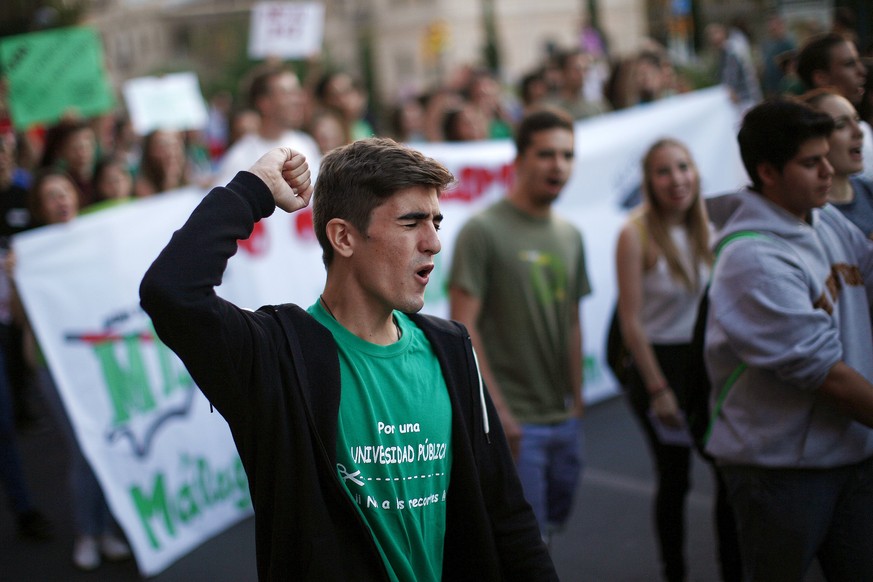 A student shouts slogans as he takes part in a &quot;March for dignity&quot; to protest against austerity measures under the slogan &quot;Pan, techo, trabajo y dignidad&quot; (Bread, housing, job and  ...