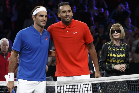 Anna Wintour, left, editor-in-chief of Vogue, looks Team Europe&#039;s Roger Federer, left, and Team world&#039;s Nick Kyrgios, prior a match, at the Laver Cup tennis event, in Geneva, Switzerland, Sa ...