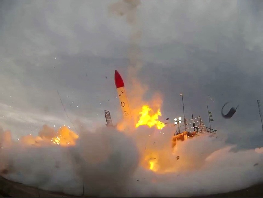 epa06851083 The MOMO-2 rocket, developed by Interstellar Technologies, crash on to the launch pad just after takeoff in Taiki town, Hokkaido, Japan, 30 June 2018. The 9.9 meter long liquid-fuel rocket ...