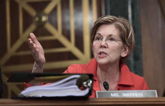 Sen. Elizabeth Warren, D-Mass., questions Wells Fargo Chief Executive Officer and President Timothy Sloan as he testifies before the Senate Committee on Banking, Housing and Urban Affairs on Capitol H ...