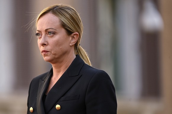 epa10883573 Italian Prime Minister Giorgia Meloni arrives at the Palazzo Montecitorio, hosting the Italian Chamber of Deputies, to attend the non-religious State funeral of late Italian President Gior ...