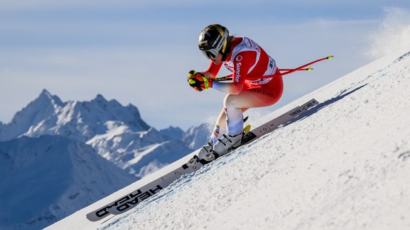 epa11018781 Lara Gut-Behrami of Switzerland in action during the Women Downhill race of the FIS Alpine Skiing World Cup in St. Moritz, Switzerland, 09 December 2023. EPA/JEAN-CHRISTOPHE BOTT