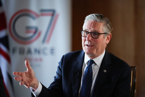 Britain's Prime Minister Keir Starmer speaks to the members of the media on the sidelines of the G7 summit, in Thonon-les-Bains, France, Wednesday, June 17, 2026. (Isabel Infantes/Pool Photo via  ...