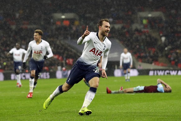 Tottenham Hotspur&#039;s Christian Eriksen celebrates after scoring his side opening goal during the English Premier League soccer match between Tottenham Hotspur and Burnley at Wembley stadium in Lon ...