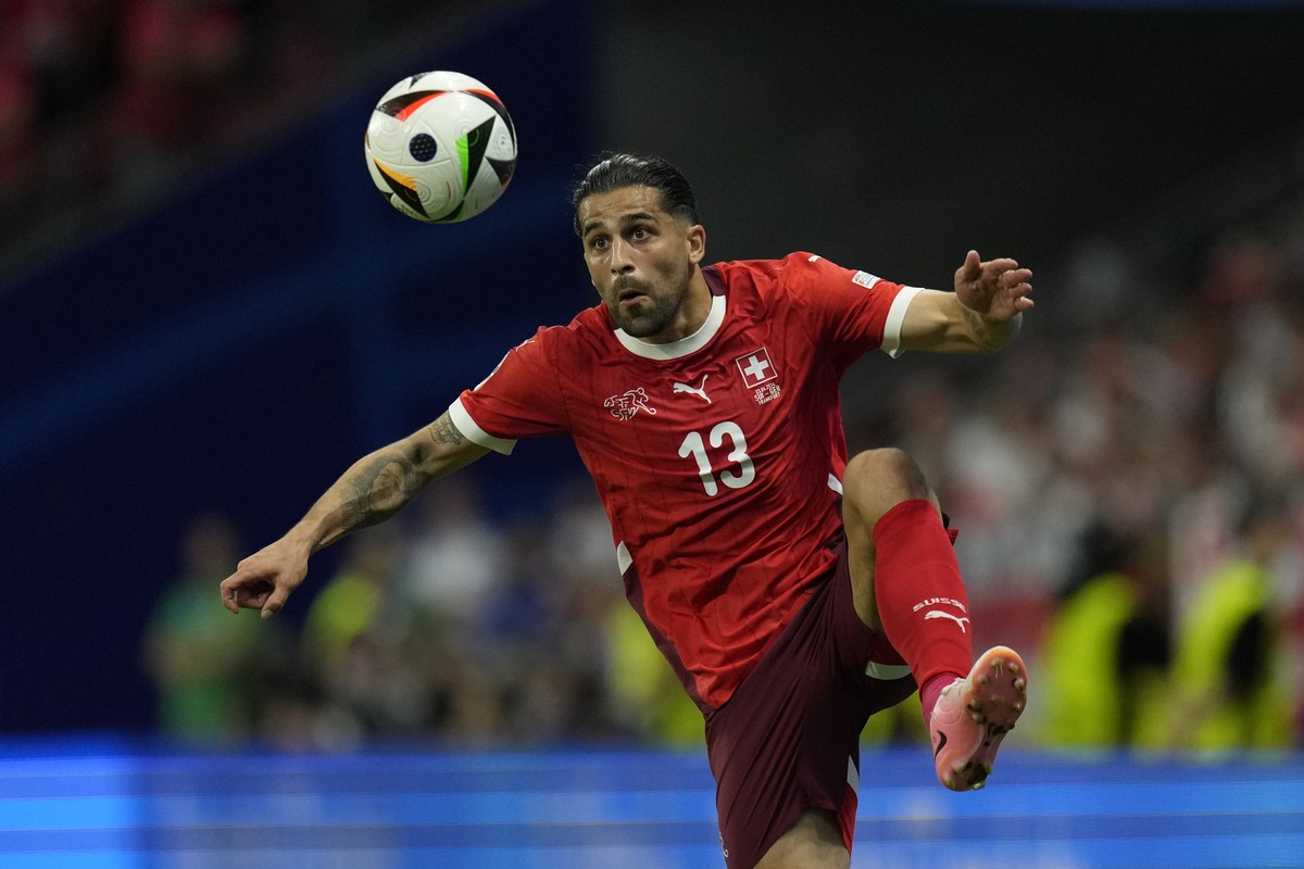 Switzerland's Ricardo Rodriguez controls the ball during a Group A match between Switzerland and Germany at the Euro 2024 soccer tournament in Frankfurt, Germany, Sunday, June 23, 2024. (AP Photo ...