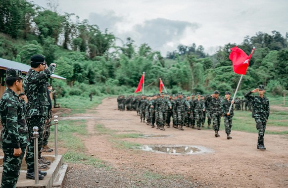 epa09236589 A handout photo made available by the National Unity Government (NGU) shows soldiers from the People&#039;s Defence Force (PDF) standing in formation during the closing ceremony of the fir ...