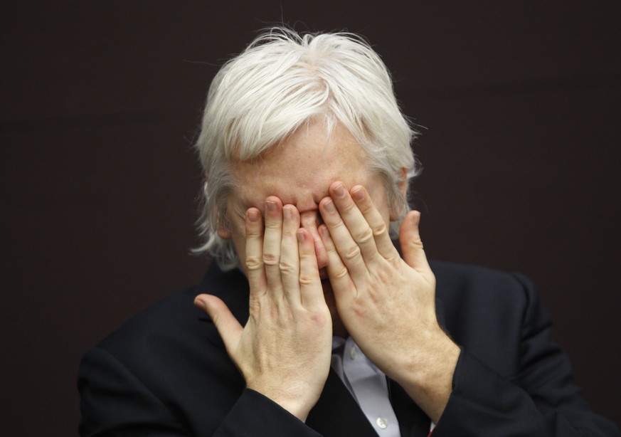 FILE - WikiLeaks founder Julian Assange gestures as he talks during a news conference in central London, Thursday, Dec. 1, 2011. The British government on Friday, June 17, 2022 ordered the extradition ...