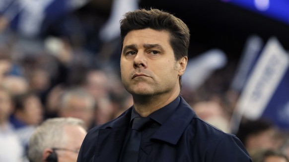 FILE - Manager Mauricio Pochettino watches the UEFA Champions League semi-final first leg match between Tottenham Hotspur and Ajax at the Tottenham Hotspur Stadium in London, on April 30, 201...