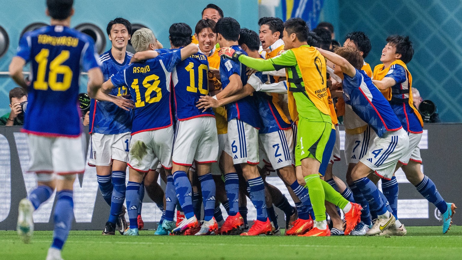 221123 Ritsu Doan of Japan celebrates with team mates after scoring 1-1 during the FIFA World Cup, WM, Weltmeisterschaft, Fussball 2022 football match between Germany and Japan on November 23, 2022 in ...