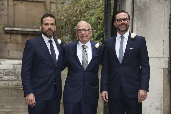 FILE - From left, Lachlan Murdoch, Rupert Murdoch and James Murdoch arrive at St Bride&#039;s Church for the celebration ceremony of the wedding of Rupert Murdoch and Jerry Hall in London, Saturday, M ...