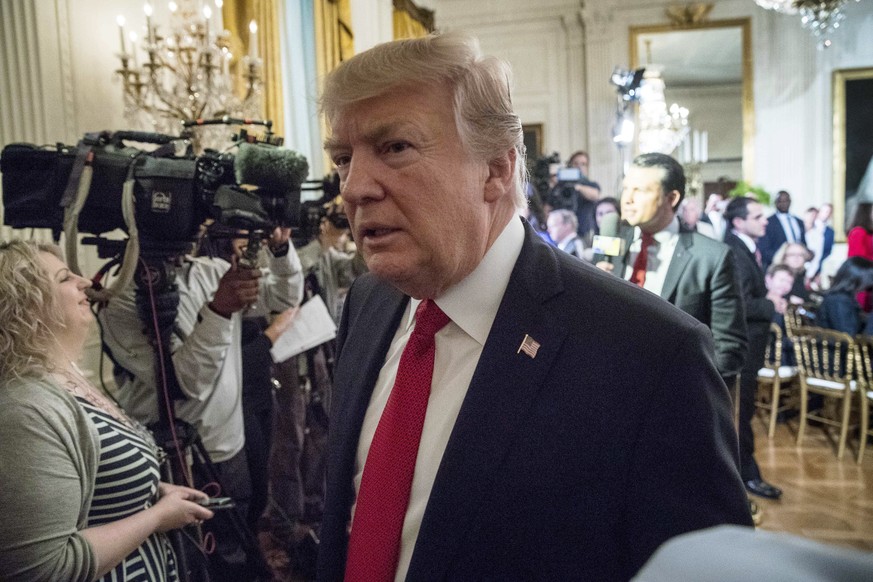 President Donald Trump leaves the East Room of the White House in Washington, Thursday, April 6, 2017, after appearing on Fox &amp; Friends before a Wounded Warrior Project Soldier Ride event. (AP Pho ...