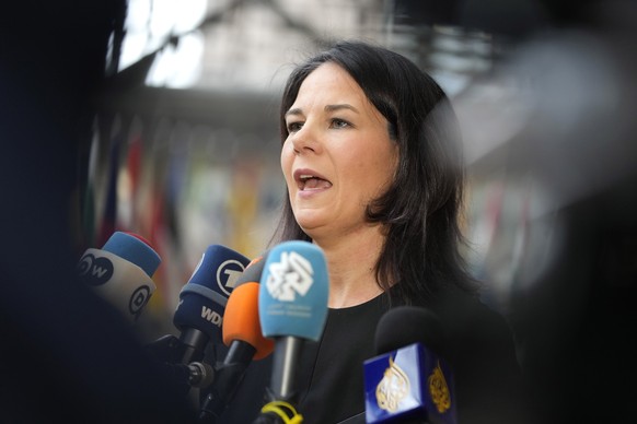 Germany&#039;s Foreign Minister Annalena Baerbock speaks with the media as she arrives for a meeting of EU foreign ministers at the European Council building in Brussels, Monday, March 18, 2024. Europ ...